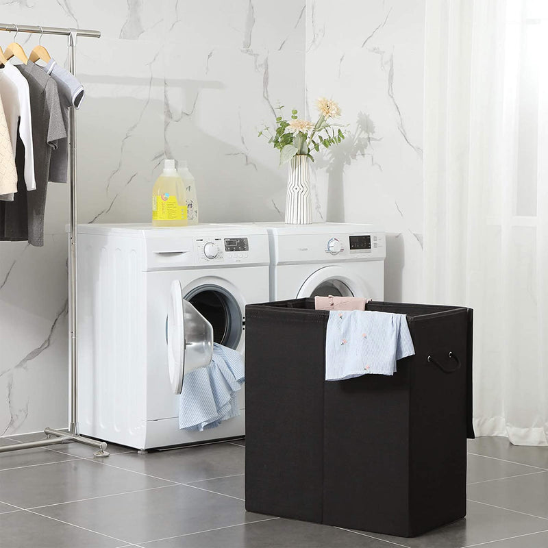 Vasketøjskurv med 2 rum i linnedstof, magnetisk låg og håndtag, foldbar, aftagelig pose.  Mål: 60x36x60 cm. Sort farve , praktisk til familier.